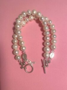 Fresh Water Pearl Double Strand Bracelet With Peace Charms